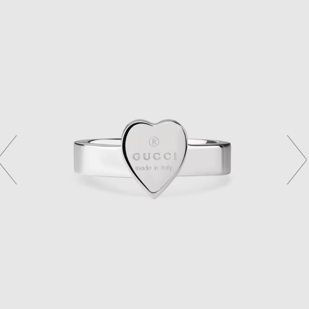 GUCCI TRADEMARK RING WITH HEART PENDANT